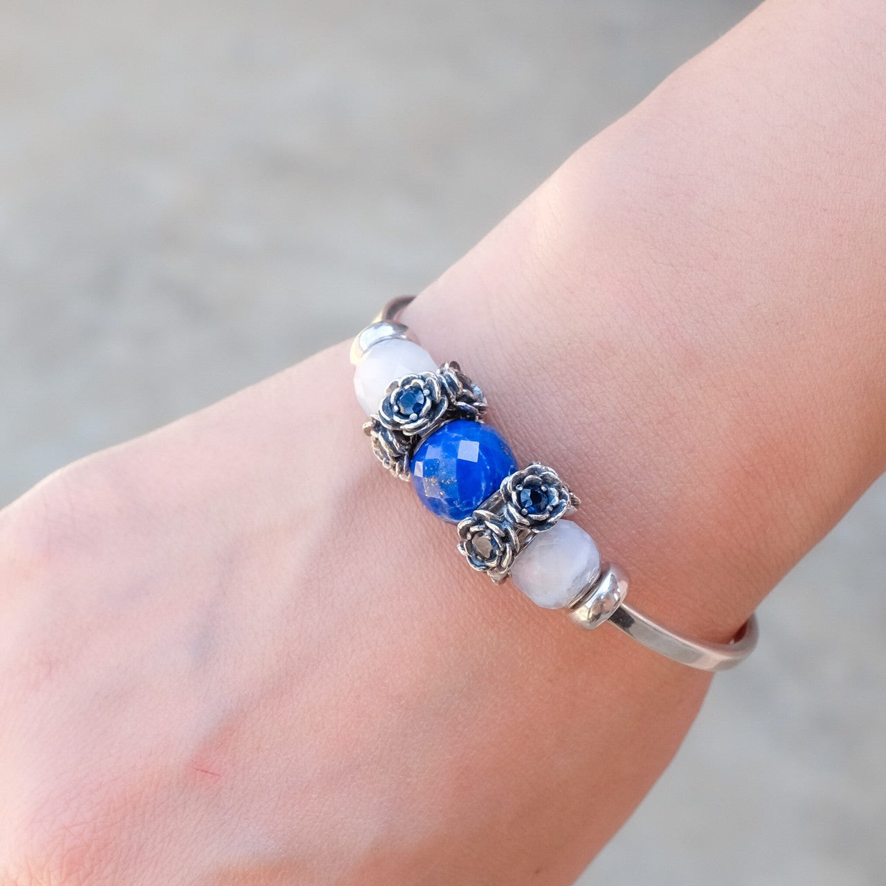 A Pair of Camelia Flower Blue Sapphire Spacer